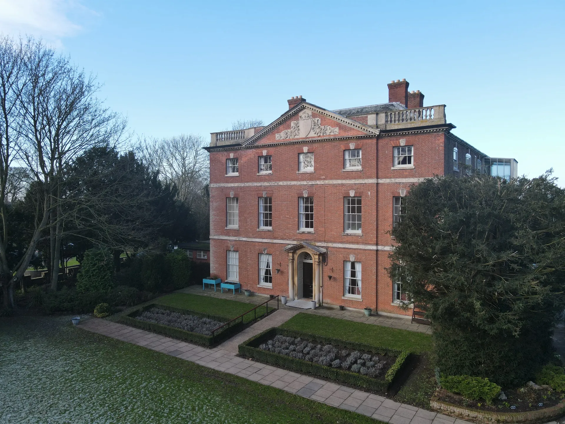 The terrace and rear gardens at Oakwood Lodge
